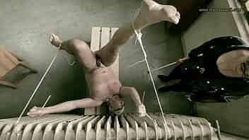 Mistress April punishes her helpless slave in prison video